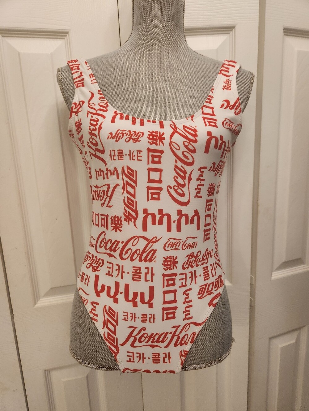 Coca Cola White Swimsuit with Red Logo Print In Universal Language